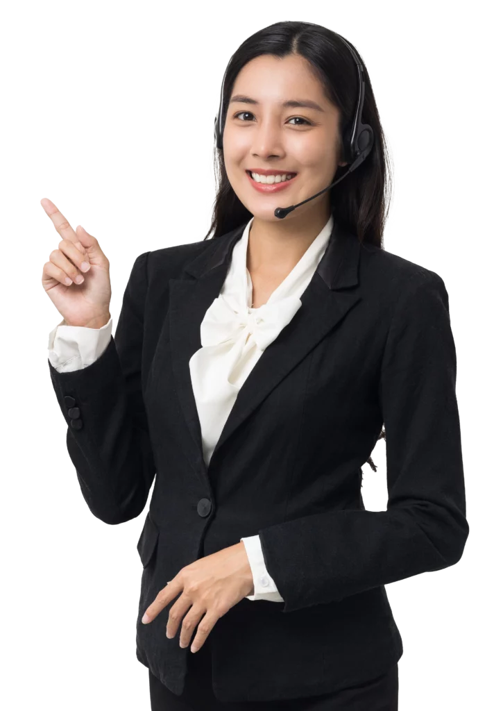 A professional woman wearing a headset and suit, smiling and pointing upwards, indicating the benefits of studying with Link Education.